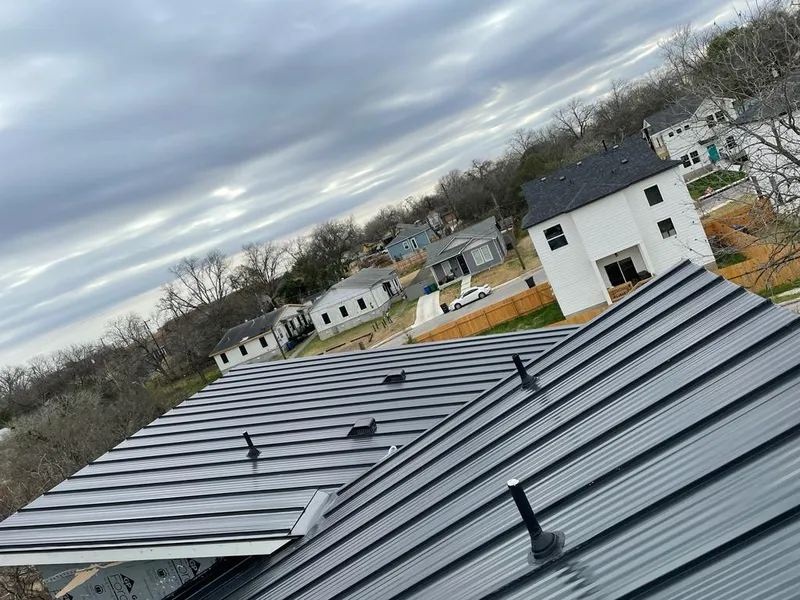 Standing seam metal roof panels with vents for Skylight Repair in Lake Shore